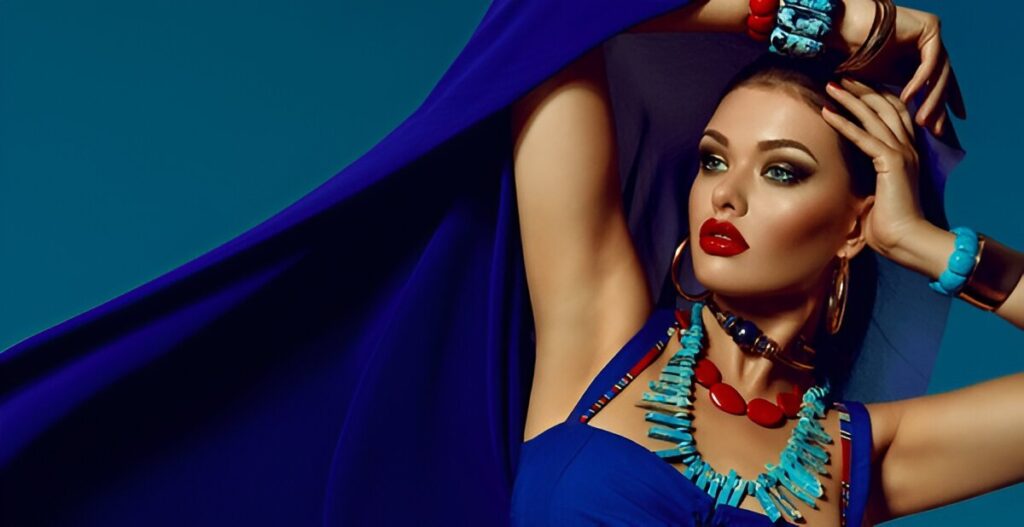 beautiful young girl in bright blue attire and a lot of turquoise jewelry